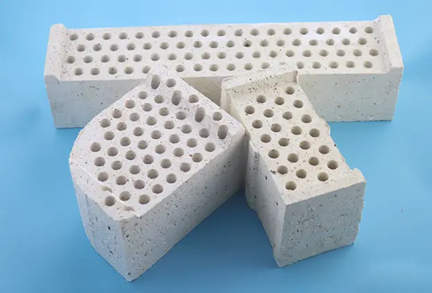 The bffle brick (supporting the regenerator refractory brick